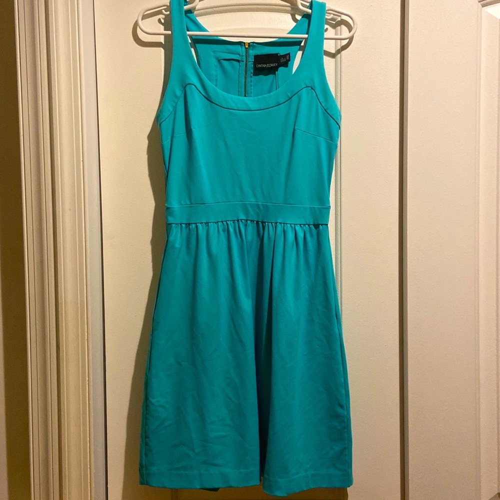 Sleeveless teal cocktail dress